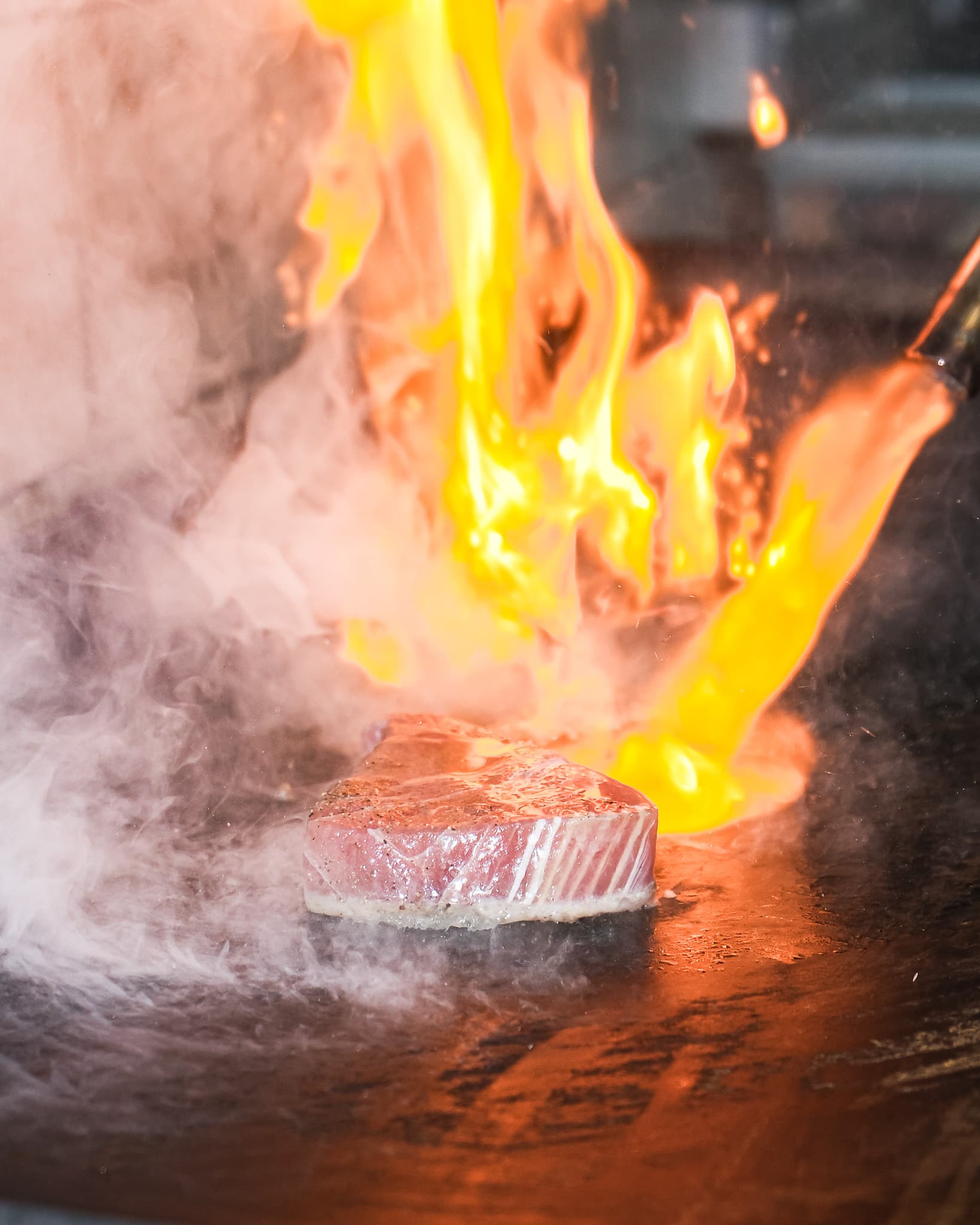 Steak searing on the grill